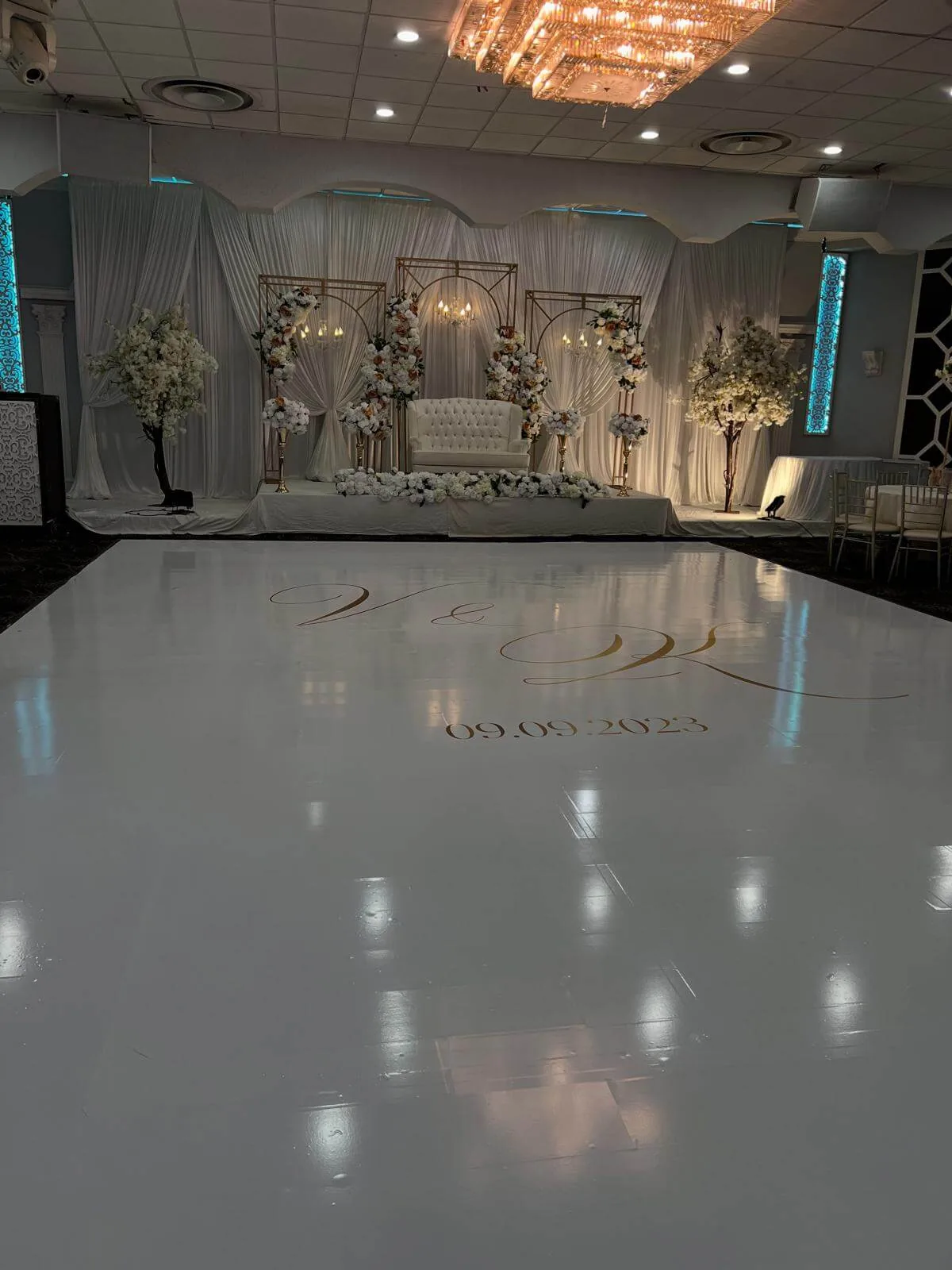Floral-dressed stage overlooking the dance floor.