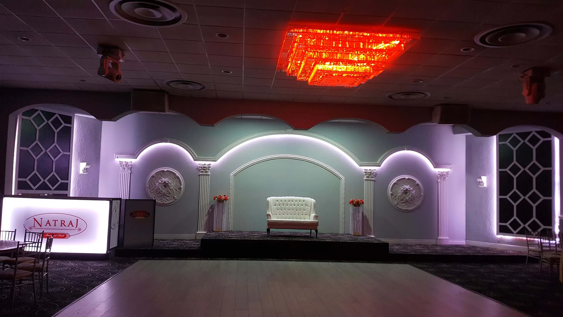 Arched architectural detail along the ballroom wall.