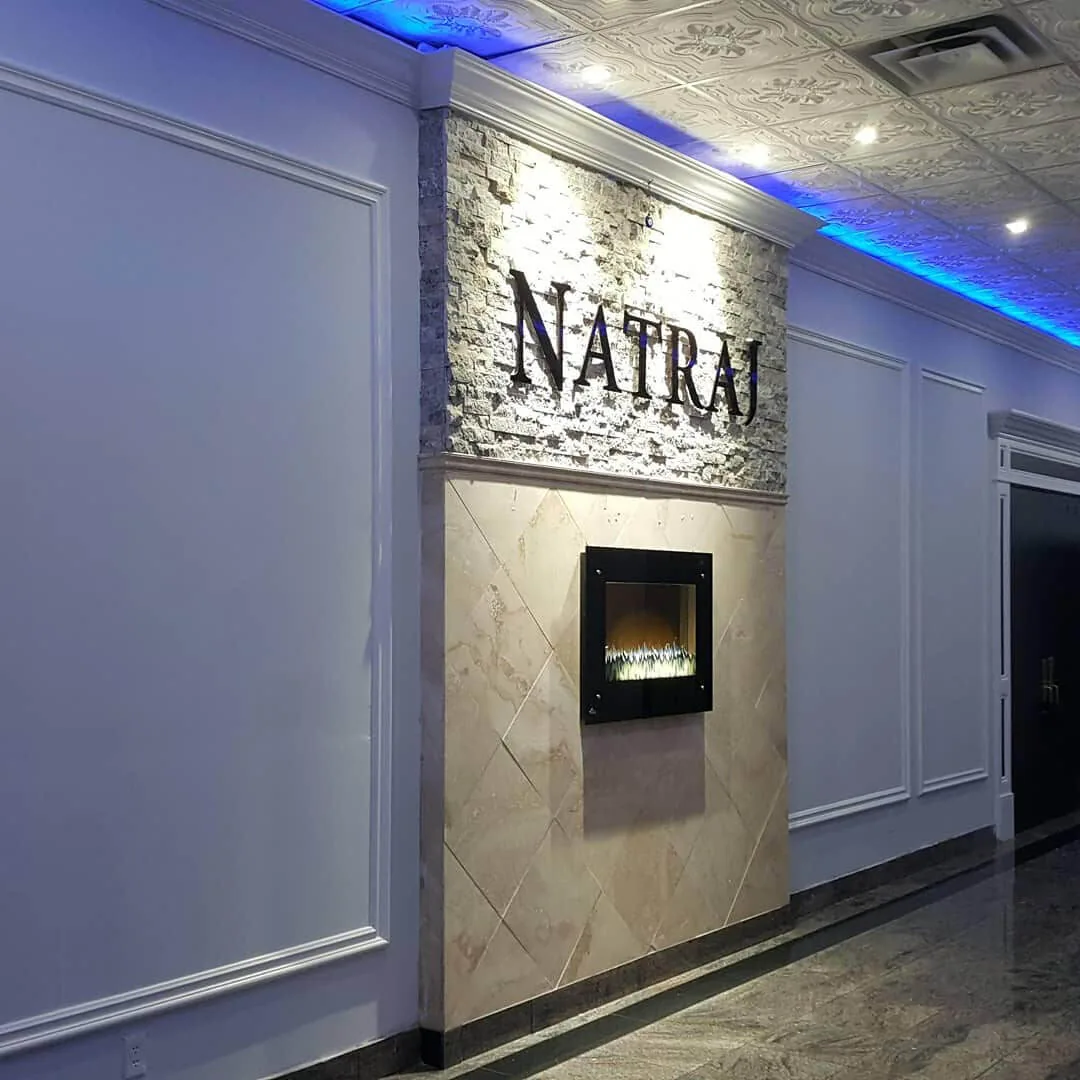Seating area around the lobby fireplace.